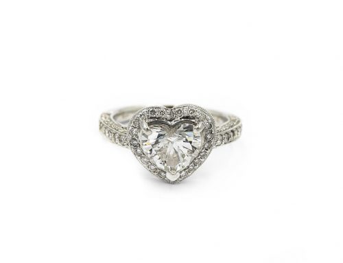 CONTEMPORARY WHITE GOLD AND HEART DIAMOND RING